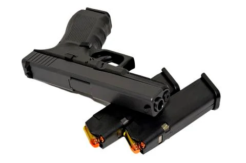 Pistol with bullets Stock Photos