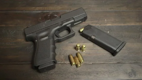 Pistol gun rack focus Stock Footage 143978080