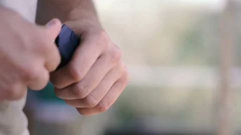 Pistol. Hands load a combat pistol to fire Video stock 113574408