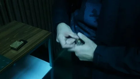 Pistol magazine loading Stock-Footage 82462076