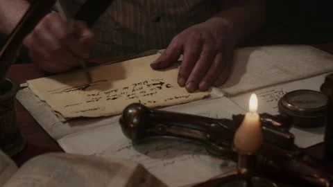 Pistol over old papers in a ship cabin Stock Footage 259694580