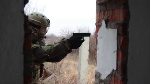 Pistol shooting in the war Stock Footage 82400941