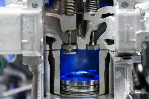 Piston diesel engine at cross section in car. Close up at piston. Stock Photos