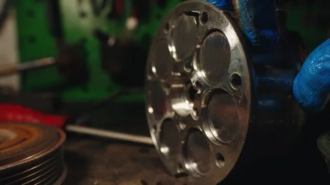Piston stroke in a car air conditioning compressor during repairs in a service Stock Footage 285642827