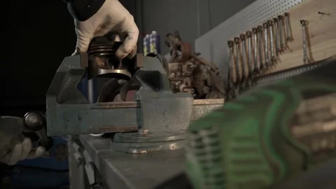Piston in a vise 001 Stock Footage 144307457