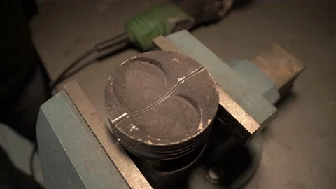 Piston in a vise 003 Stock Footage 144307469