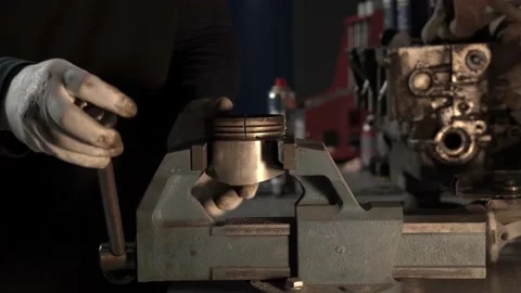Piston in a vise 005 Stock Footage 144307495