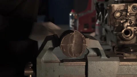 Piston in a vise 006 Stock Footage 144307494