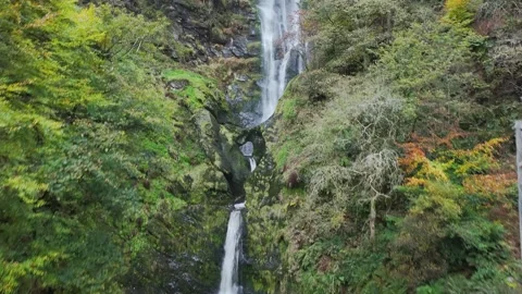 Pistyll Rhaeadr Waterfall and Berwyn Mountains from a drone, Oswestry, Wales Stock-Footage 319911947