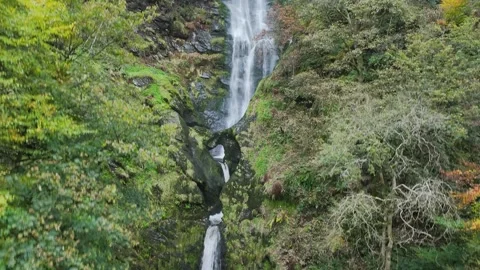 Pistyll Rhaeadr Waterfall and Berwyn Mountains from a drone, Oswestry, Wales Stock-Footage 319911957