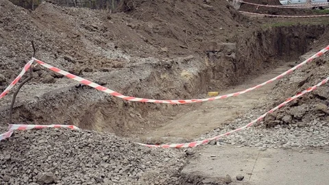 Pit dug protective red tape Stock Footage 104247511