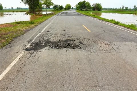 Pit on highway. Stock Photos