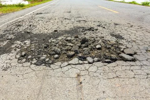 Pit on highway. Stock Photos