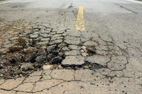 Pit on highway. Stock Photos