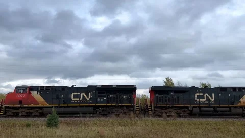 PIT, MN - 12 OCT 2025: Canadian National train engine traveling Stock Footage 319052237