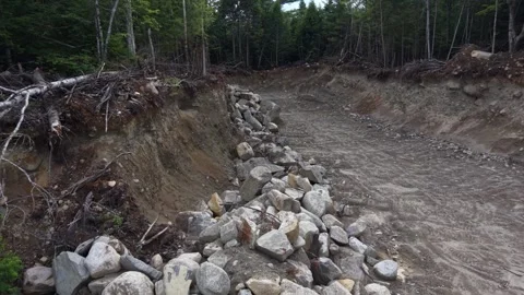 Pit over rocks 6-22-26 Stock Footage 344616539