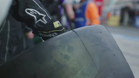 Pit Stop at Car Race - Race Tires Formula 1, Racing Slicks, Slick Tyre Auto Race Stock Footage 146530751