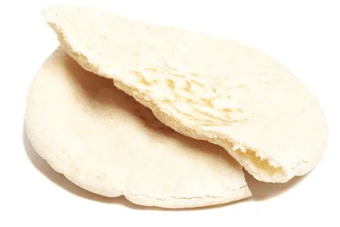 Pita bread broken in half isolated on white background. National cuisine. Hea Stock Photos