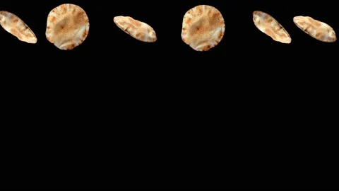 Pita bread falling down in slow motion on black background Stock Footage 194602523