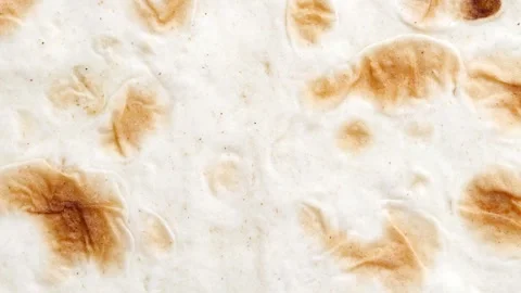 Pita flat close-up rotating, turning, macro Stock-Footage 242360820