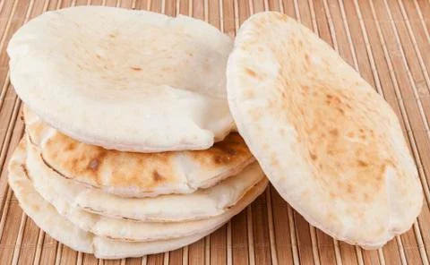 Pitas on wood Stock Photos