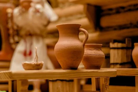 A pitcher of clay on the table 库存照片