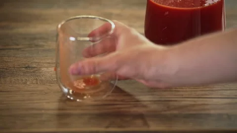 Pitcher of Fresh Tomato Juice with Empty Glass in Natural Setting 스톡 동영상 340483319