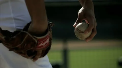 Pitcher Handles Ball Stock Footage