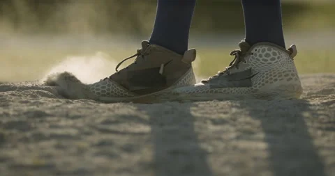 Pitcher kicking dust up on a mound. Baseball. Stock Footage 132443897