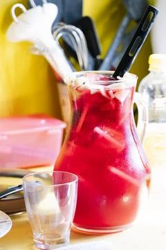 Pitcher of sangria with ice in the kitchen Stock Photos