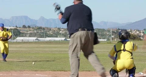 Pitcher spotting runner running home pitching baseball as catcher tagging runner Stock Footage 344330527