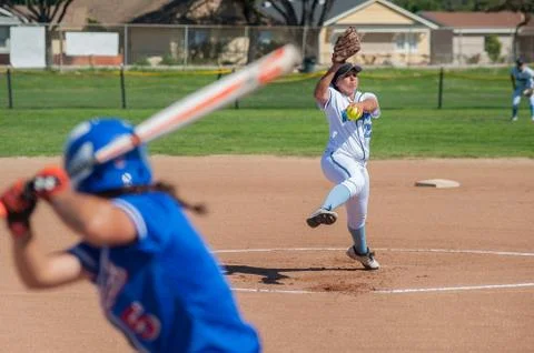 Pitcher in white bringing heat Stock Photos