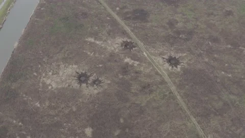 Pits after explosions from shells. War. Ukraine. aerial photography. Irpin city 스톡 동영상 178119990