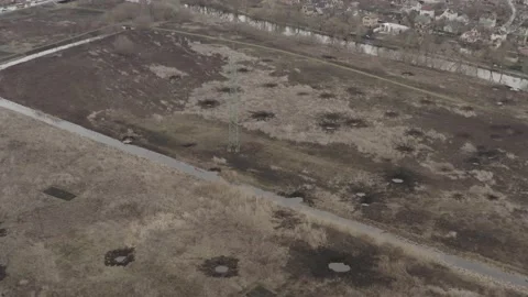 Pits after explosions from shells. War. Ukraine. aerial photography. Irpin city Stock Footage 178130655