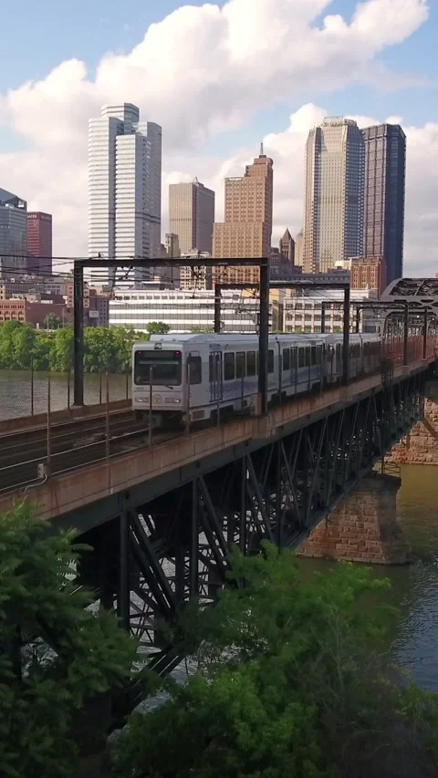 Pittsburgh Light Rail Train and Skyline Vertical Stock Footage 342566269
