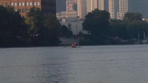 Pittsburgh River - Rowing beside City Stock Footage 107142653