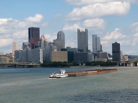 Pittsburgh waterfront with barge Stock Photos
