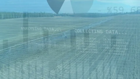 Pivot irrigation arm advancing across field, sensors collecting data and Stock Footage 332843895