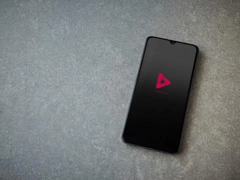 PixaMotion app launch screen with logo on the display of a black mobile smart Stock Photos