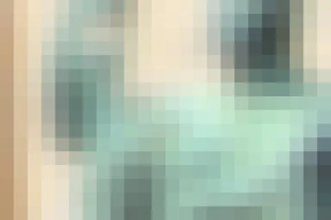 Pixel background pattern - pastel color grid blur texture. Stock Photos