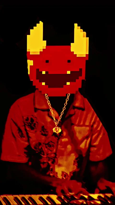 Pixelated devil playing keyboard in hawaiian shirt looped animation Stock Footage 328296014