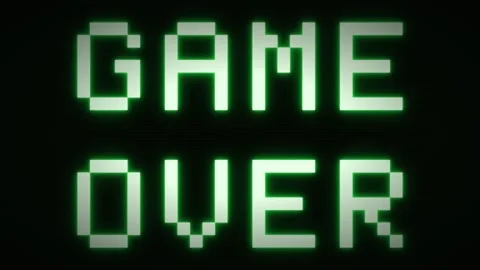 Pixelated green text GAME OVER on a dark screen with subtle scan lines 動画素材 335826749