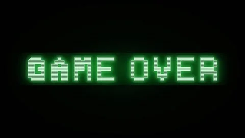 Pixelated green text GAME OVER on a dark screen with subtle scan lines 動画素材 335826750
