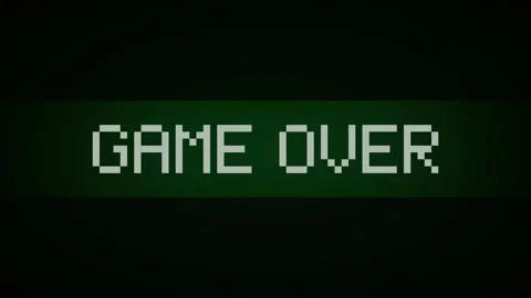 Pixelated green text GAME OVER on a dark screen with subtle scan lines 動画素材 335826751