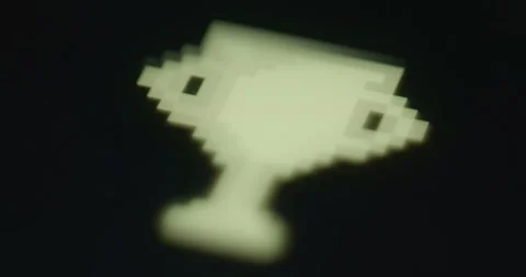 Pixelated trophy icon isolated on black background Stock Footage 313436560