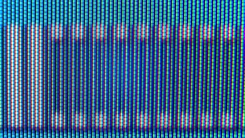 Pixels in the working old analog TV screen close up. Red, blue and green dot Stock Footage 145914044