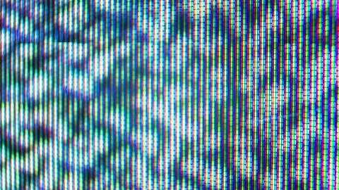 Pixels in the working old analog TV screen close up. Red, blue and green dot Stock Footage 145914159