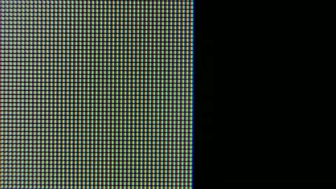 Pixels zoomed in with red, blue, and green glowing crystals and patterns on a Video stock 139860484