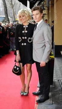  Pixie Lott and Oliver Cheshire at the Tesco Mum of the Year awards held a... 写真素材
