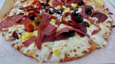 Pizza and potato chips with fried onion rings Stock Footage 74483019